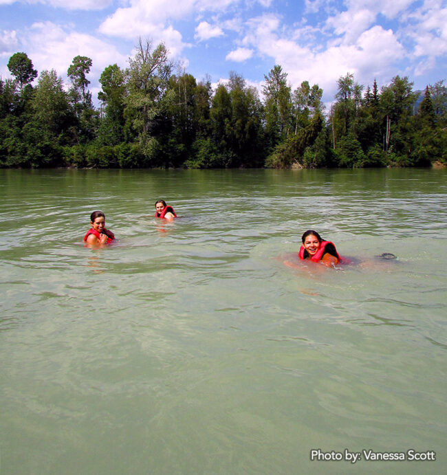 Brandi Wattam, Ella Parker and Myka Kollman swimming in the upper Fraser.
