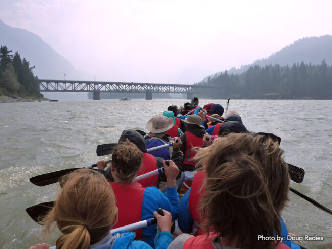 SLLP participants and guests paddling the Voyageur canoe on the Lower Fraser River.